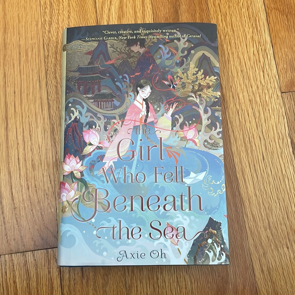 Hardcover Brand new The Girl Who Fell Beneath the Sea Book